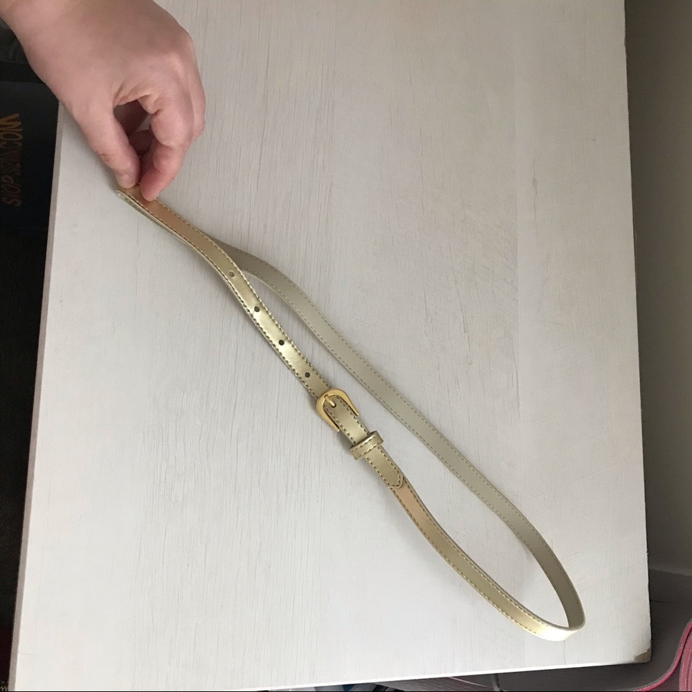 Skinny metallic gold belt